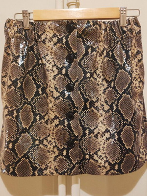Zara mini skirt used with embossed gloss texture and animal print