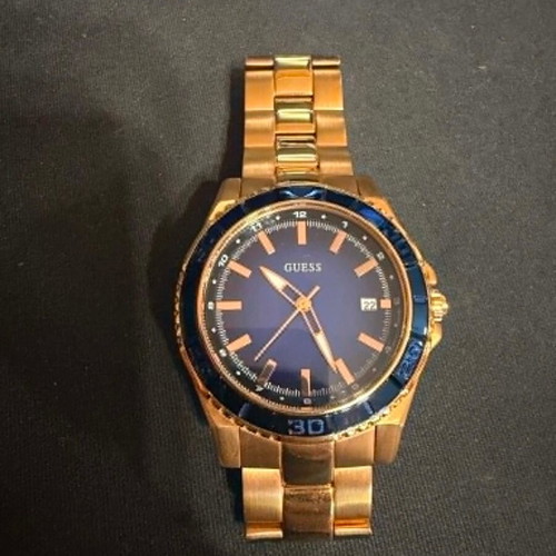 Guess W0469L2 watch used, stainless steel rose gold, blue dial 36mm
