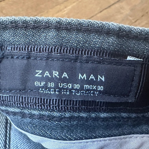 Zara black pants size 38 used with button damage