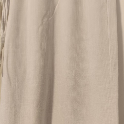 Women's loose beige pants with elastic waist and drawstring