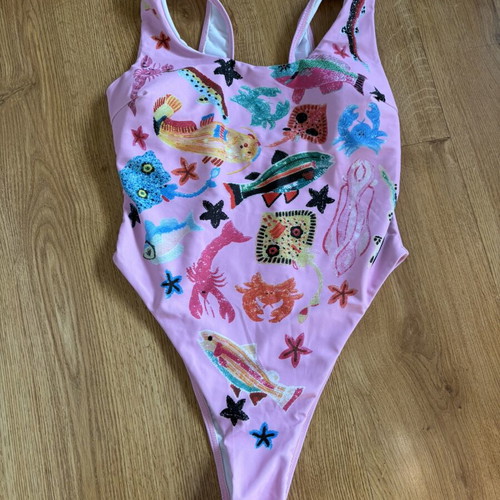 Women's one-piece swimsuit pink with colorful sea life print