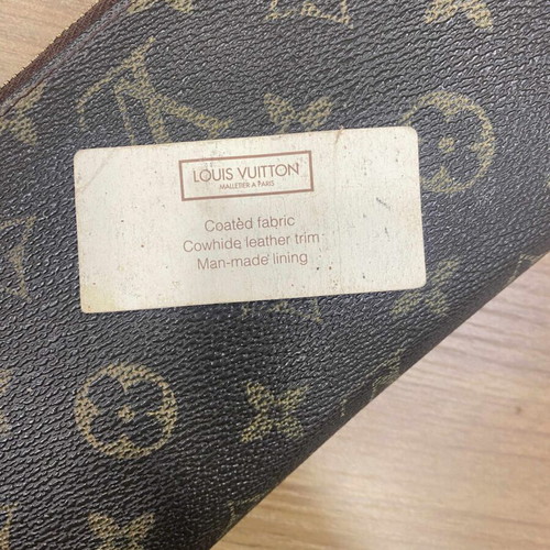 Louis Vuitton double zipper monogram wallet used, brown