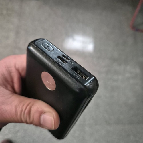 USAMS Power Bank 10,000mAh used with digital display and built-in cables