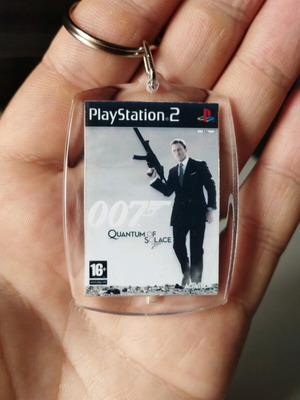 007 Quantum of Solace PS2 keychain, transparent acrylic