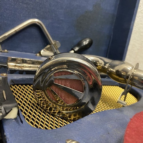 Old gramophone used with crank and over 20 spare needles