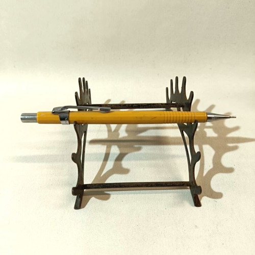 Desk set used with pen holder, stamp holder, inkwell and blotter