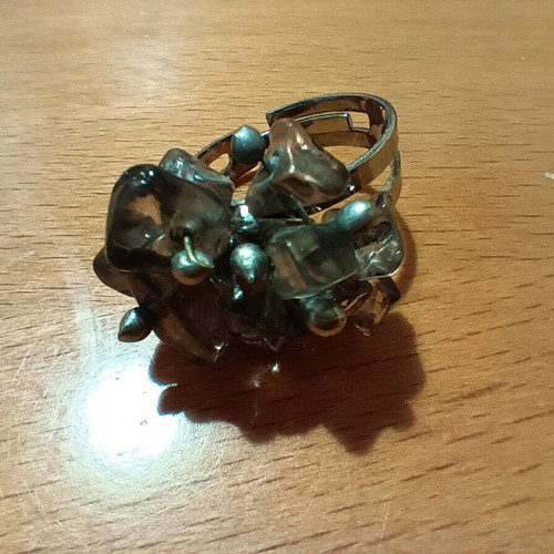 Faux ring with intricate design and adjustable size, new, silver
