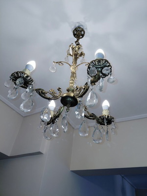 Chandelier with brass body and crystals from 1970s like new