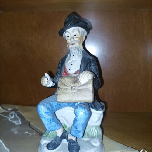 Vintage decorative figurine like new with seated old man