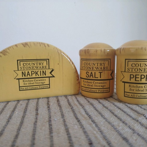 Salt and pepper set with napkin holder used