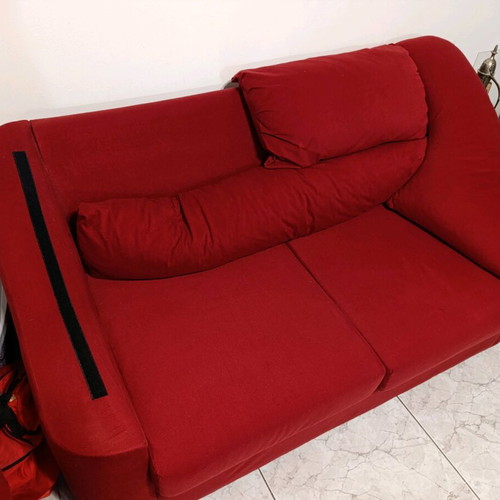 Two-seater waterproof sofa like new with removable cushions