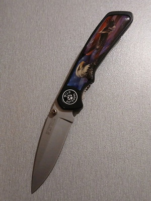 Wild Outdoors pocket knife like new with eagle decoration