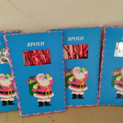 Vintage Christmas tinsel in red, gold and silver