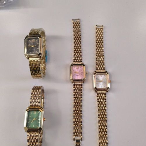 Set of 4 new women's gold watches