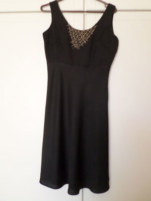 Black dress with gold design size M like new