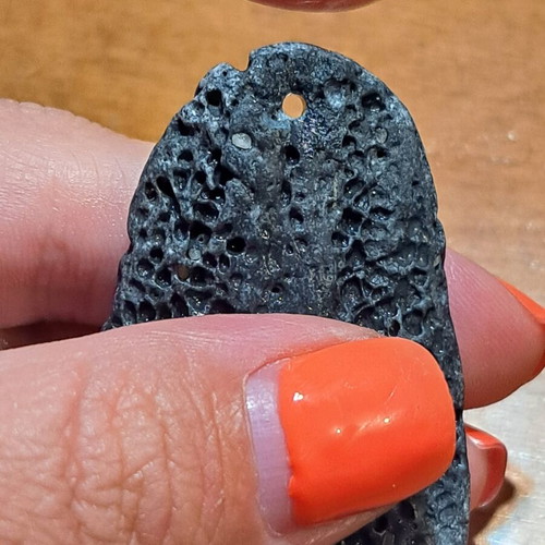 Natural raw stones like new, oval terracotta and textured gray