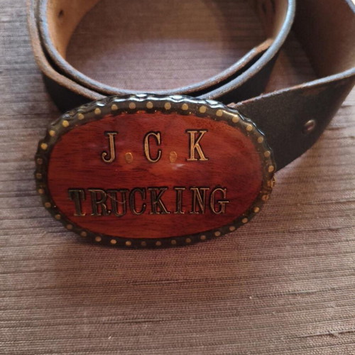 Vintage leather belt used with handmade wooden J.C.K. Trucking buckle