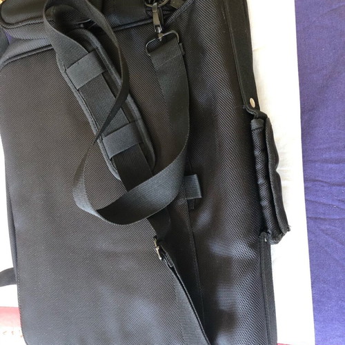 Bag black new with 4 inner pockets for travel and office use