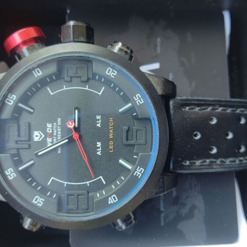 Weide wristwatch new, black leather strap
