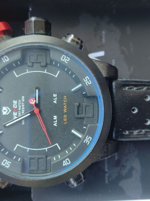 Weide wristwatch new, black leather strap