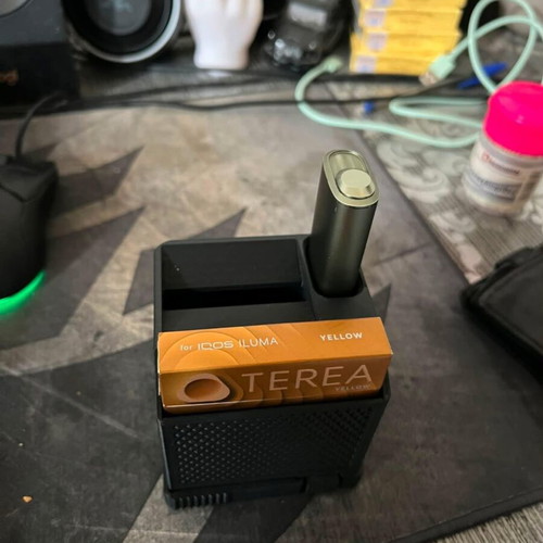 Icos holder with built-in ashtray