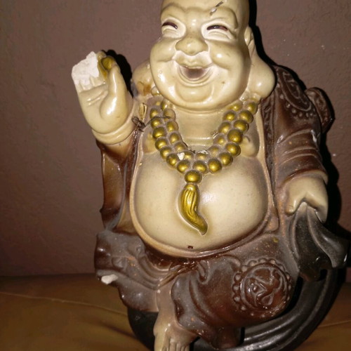 Budai statue used, symbol of happiness and prosperity