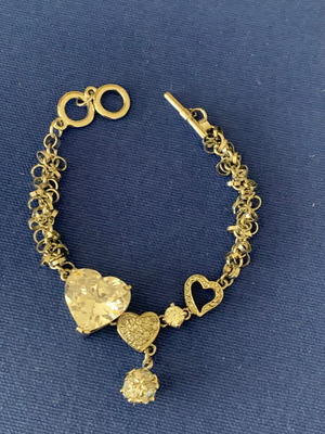Bracelet with hearts used, silver color
