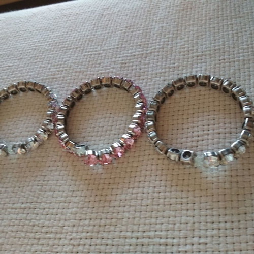 Set of three tennis bracelets like new, pink and white