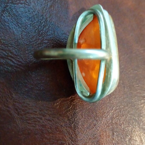 Silver women's ring with amber used