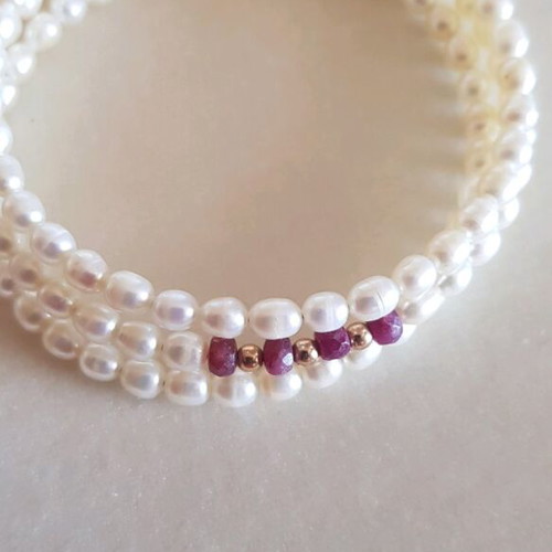 Jewelry set used with pearls, rubies and 14K gold beads bracelet and ring