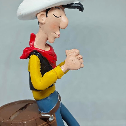 Lucky Luke collectible figure in barrel like new 19cm