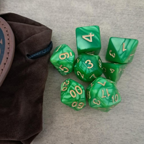 Round runic leather dice bag with green marbled D&D dice set