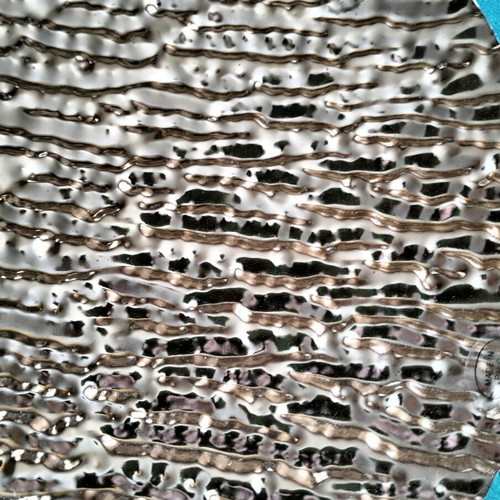In art metal platter new, dimensions 35x20