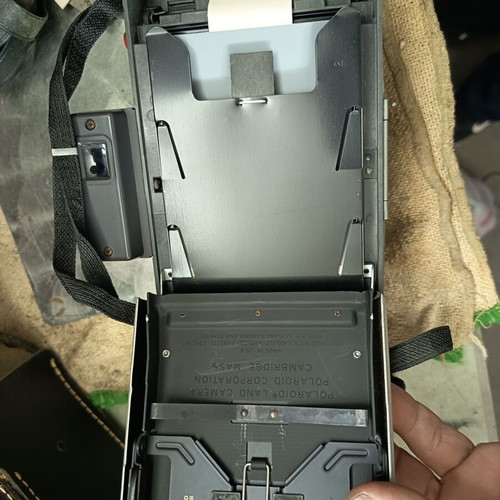 Polaroid 210 camera used with carrying case and manuals