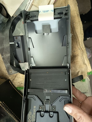 Polaroid 210 camera used with carrying case and manuals
