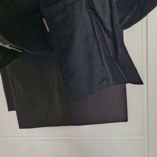 Louis Vuitton Uniformes brown suit, unworn
