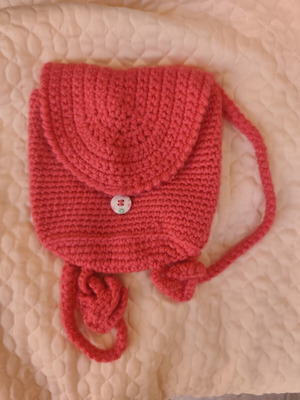 Handmade knitted children's backpack coral pink