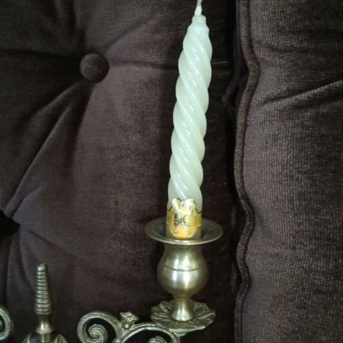 Vintage brass candlestick used with candles and gift of two candles