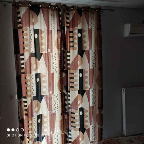 Curtains with grommets like new, two panels 1.40x2.60m each, medium shading