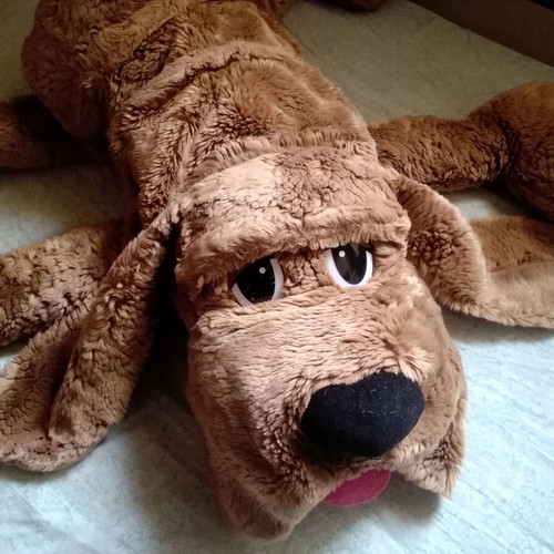 Large plush dog in brown color like new