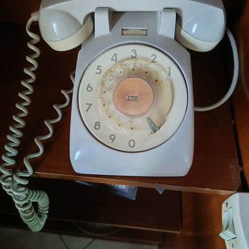 Old telephone with dial used
