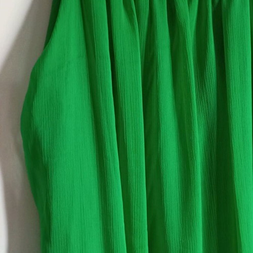 Viscose dress used with gold details, green color