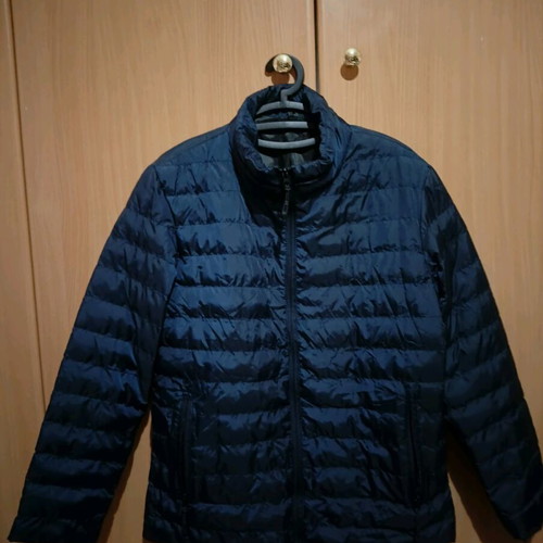 New dark blue quilted jacket.