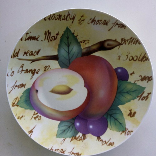 Ceramic serving platter with matching spatula, fruit design