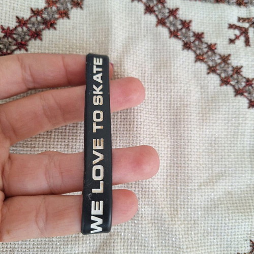 Black elastic rubber bracelet with letters used