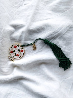 Handmade lucky charm with metal elements and tassel new