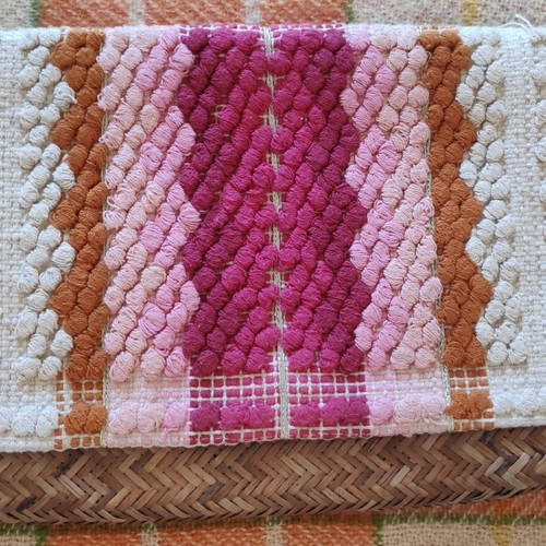 Oysho straw handbag used with boho pom pom design