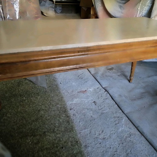 Coffee table with wooden base and marble top used