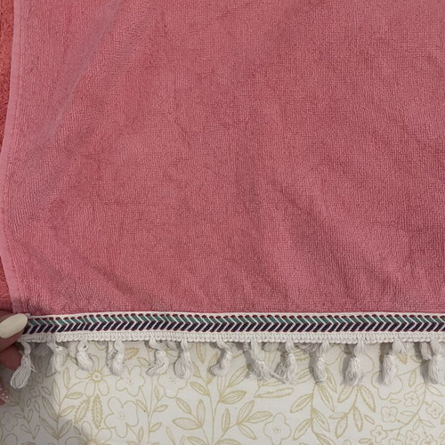 Beach towel used, coral color