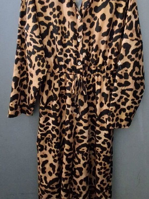 Women's animal print jumpsuit new, one size